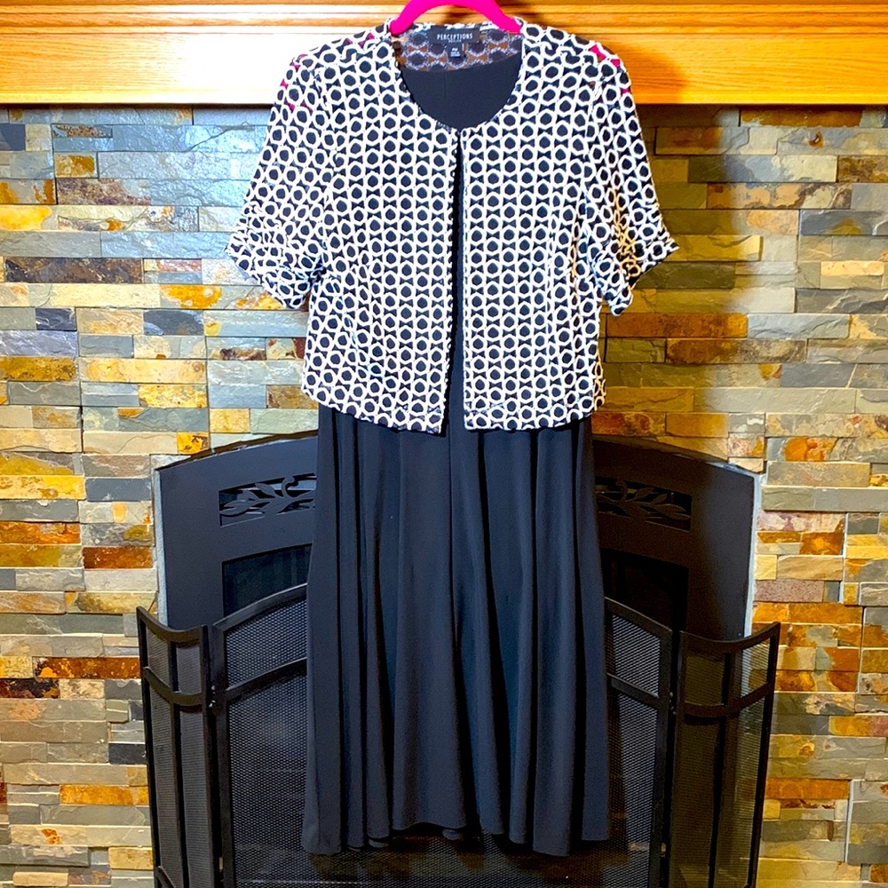 Black dress, white circle jacket